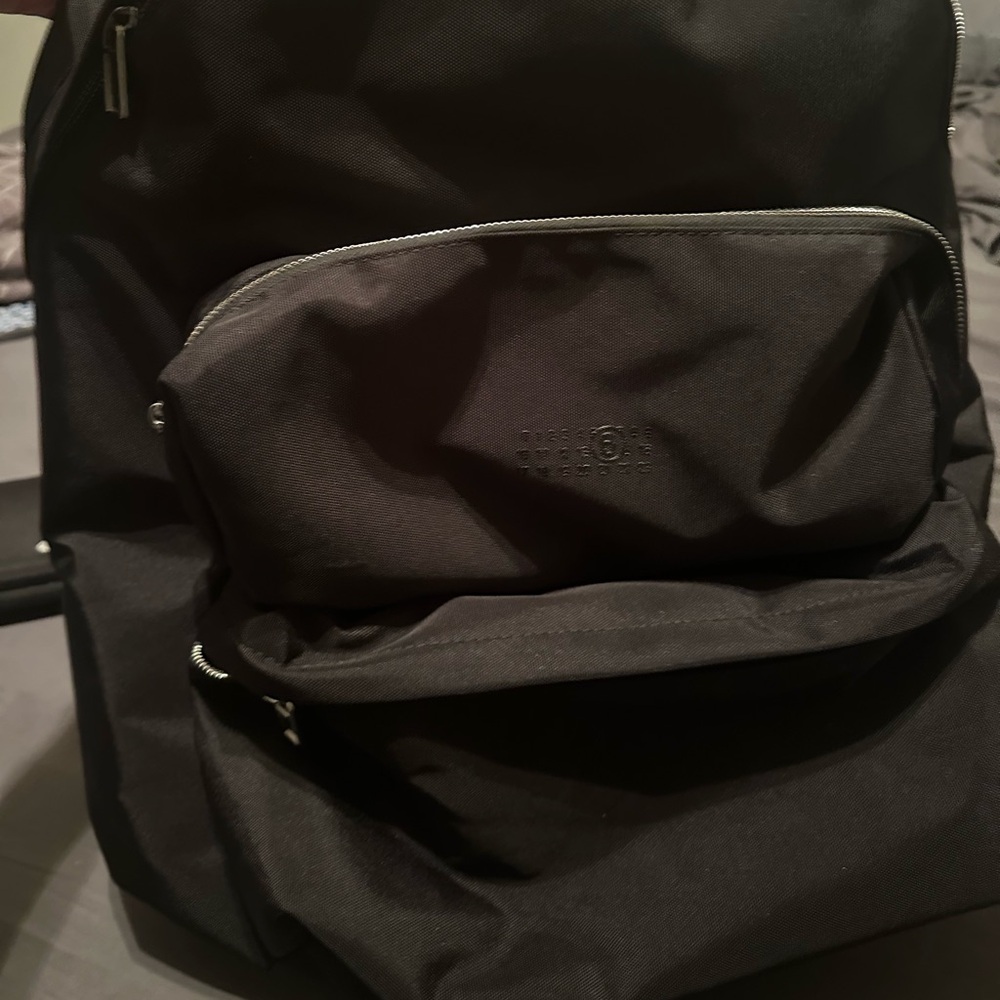 MM6 MAISON MARGIELA
Black Three-Pocket Cordura Backpack